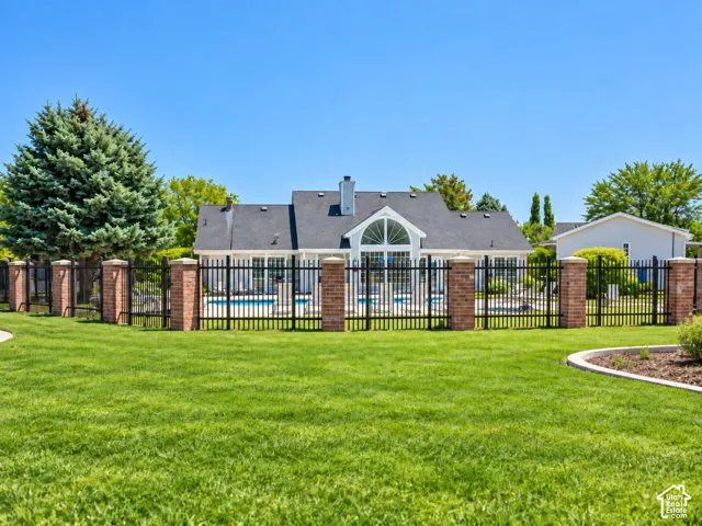 Expansive lawn with manicured landscaping