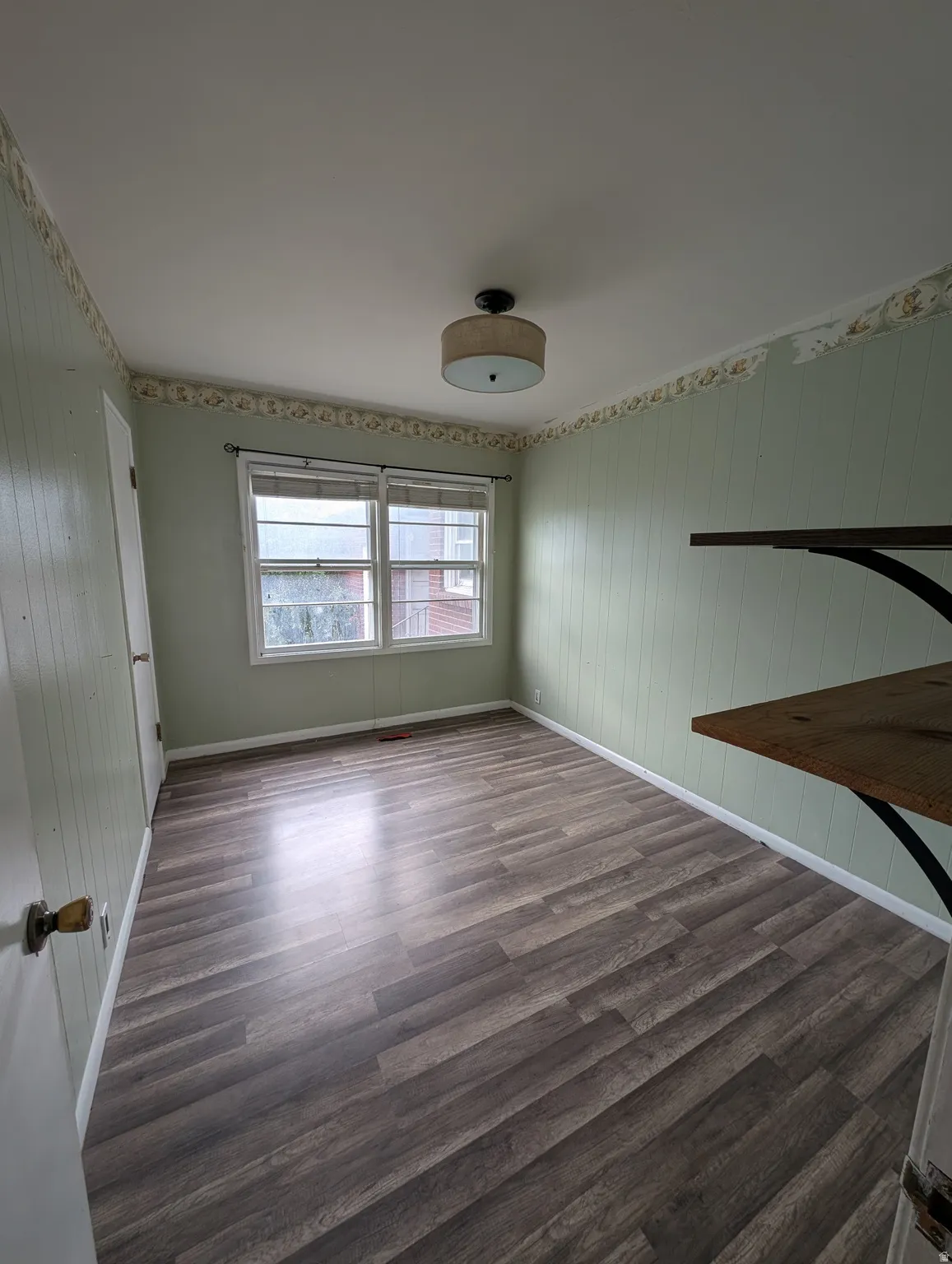Wood-finish flooring with white trim