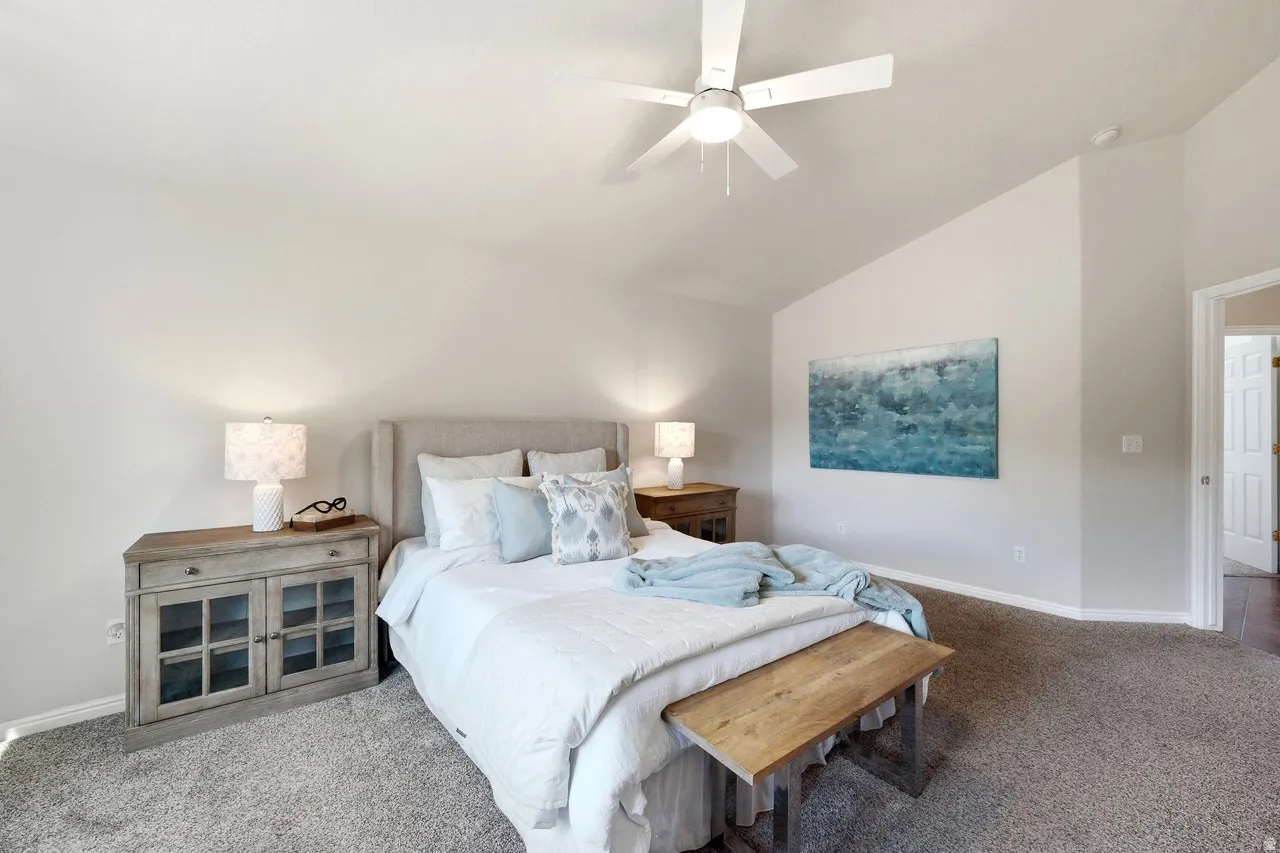 Vaulted ceiling with a ceiling fan