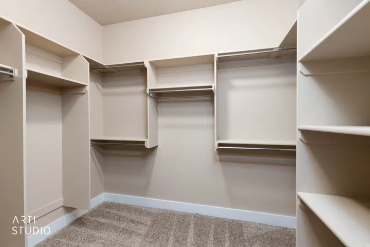 Built-in closet organization system featuring shelving and hanging rods