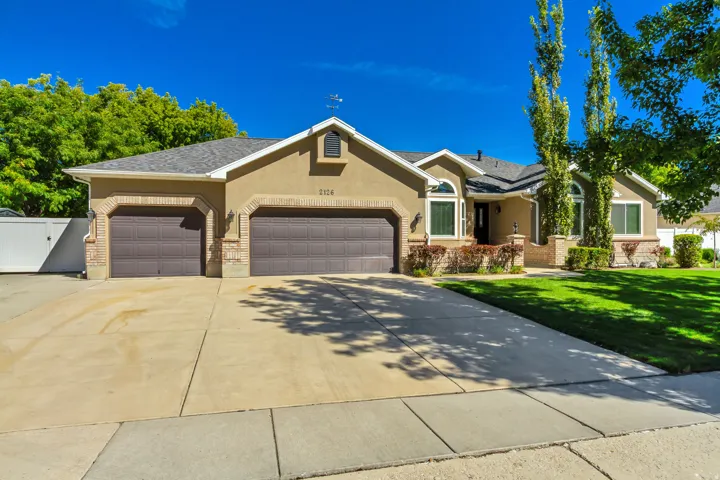 Stucco exterior with brick accents