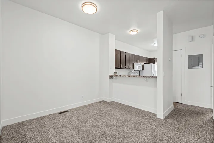 Dining area with breakfast bar.