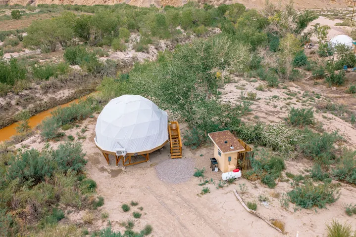 Geodesic dome structure with an elevated platform