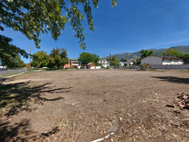 Cleared lot with visible mountain backdrop