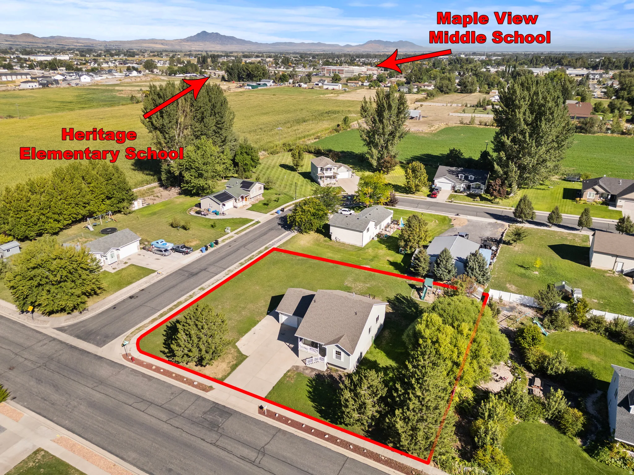 Aerial perspective of a corner lot property