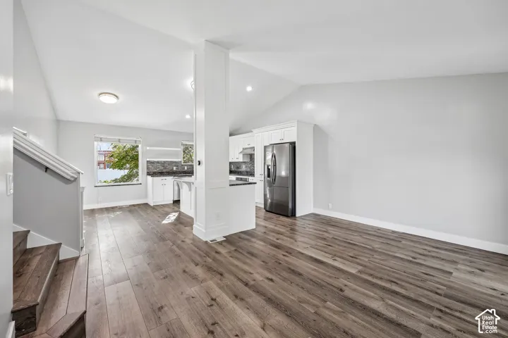Vaulted ceilings complement wood-finish flooring