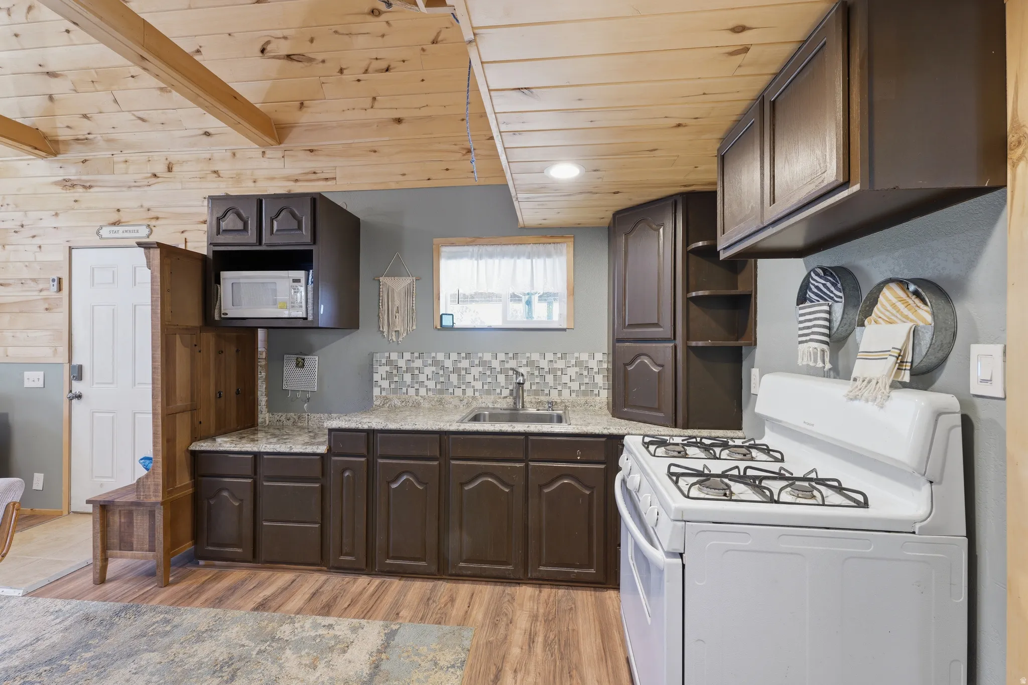 Wood-finish flooring with a wood plank ceiling