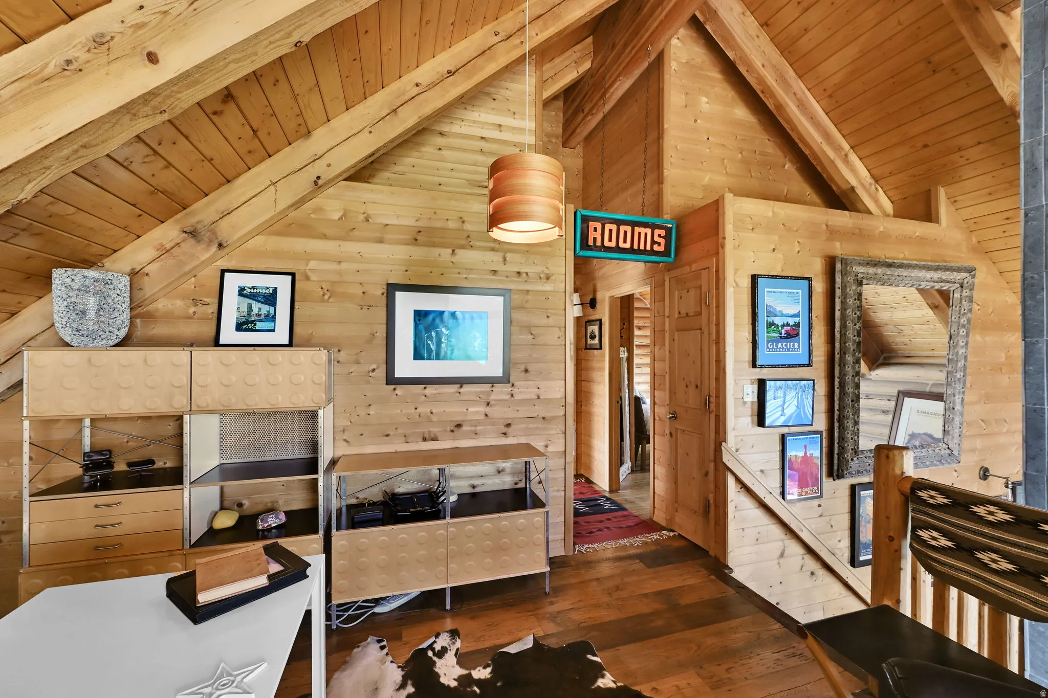 Vaulted wood-paneled ceiling with exposed beams