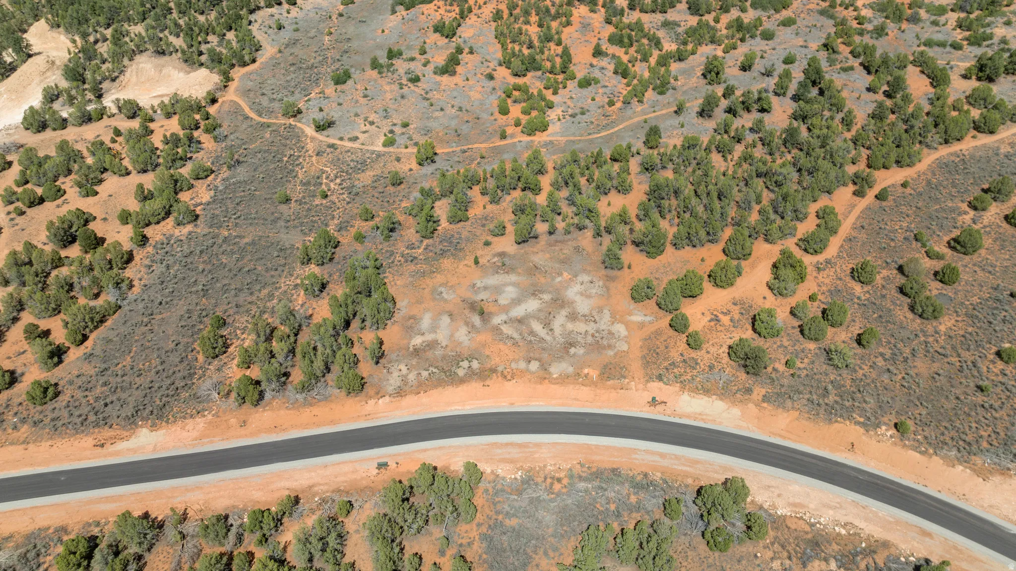 Paved road frontage with direct property access