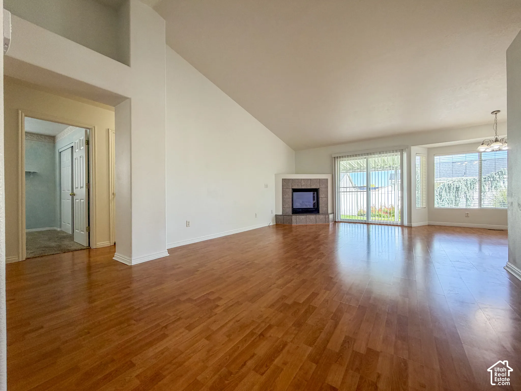 Vaulted ceilings above wood-finish flooring