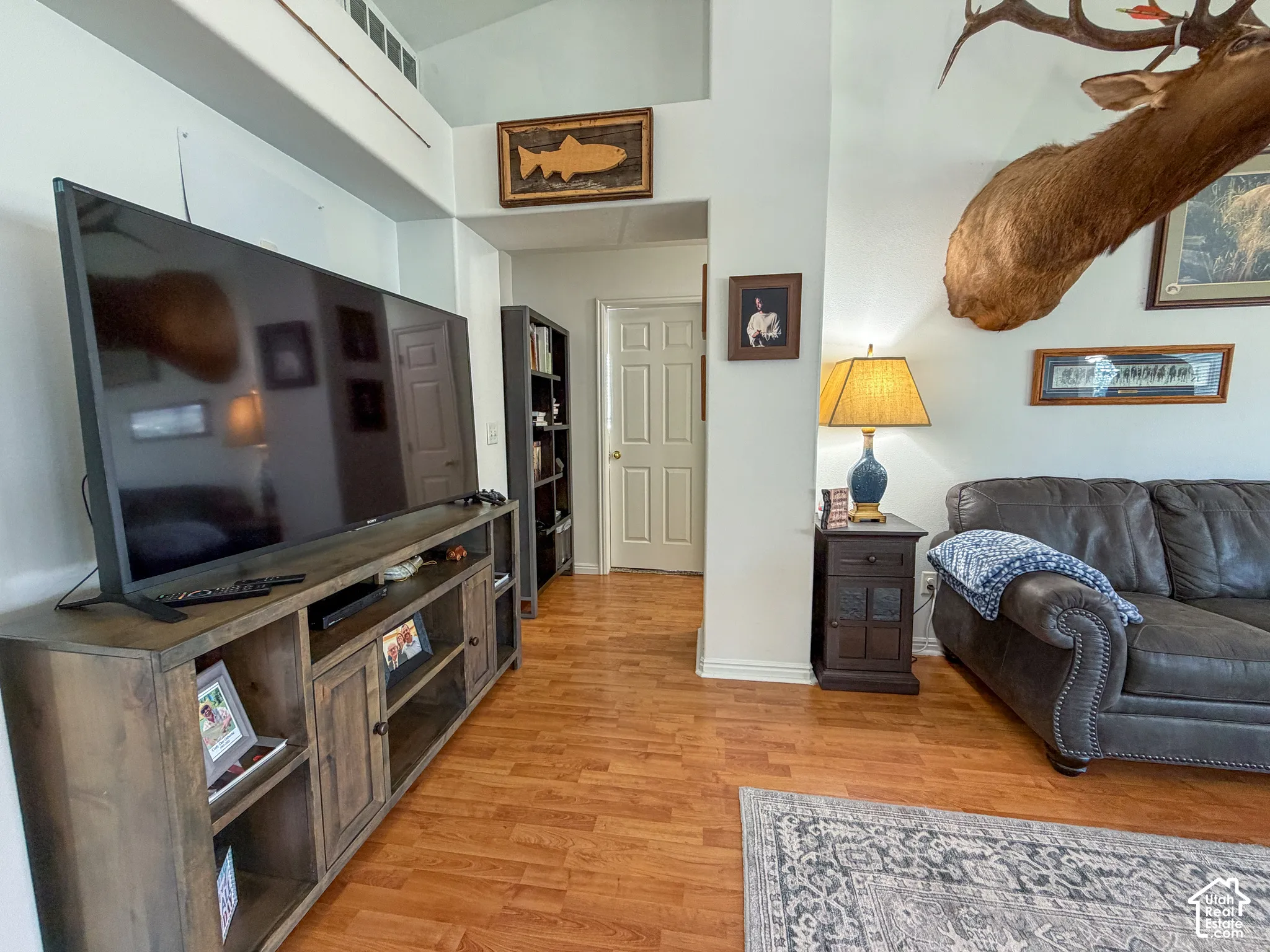 Wood-finish flooring throughout the space