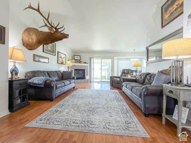 Vaulted ceilings with wood-finish flooring