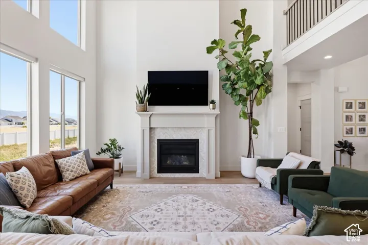 Vaulted ceilings and abundant natural light highlight the living area