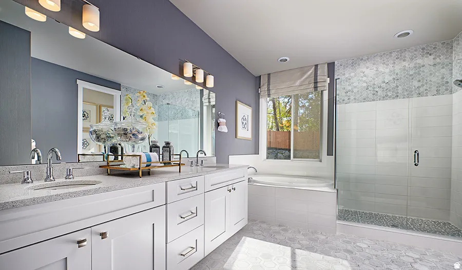 Dual vanity with undermount sinks and light-toned countertops