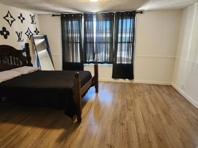 Wood-finish flooring throughout