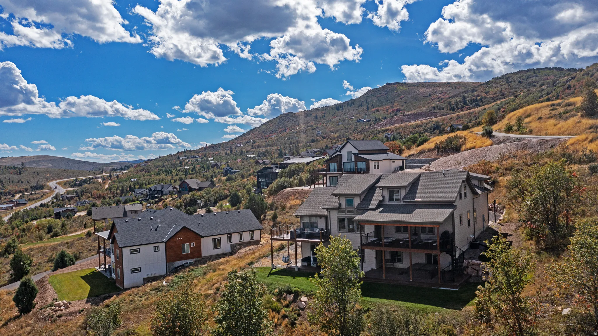 Hillside residential setting with multiple levels of construction