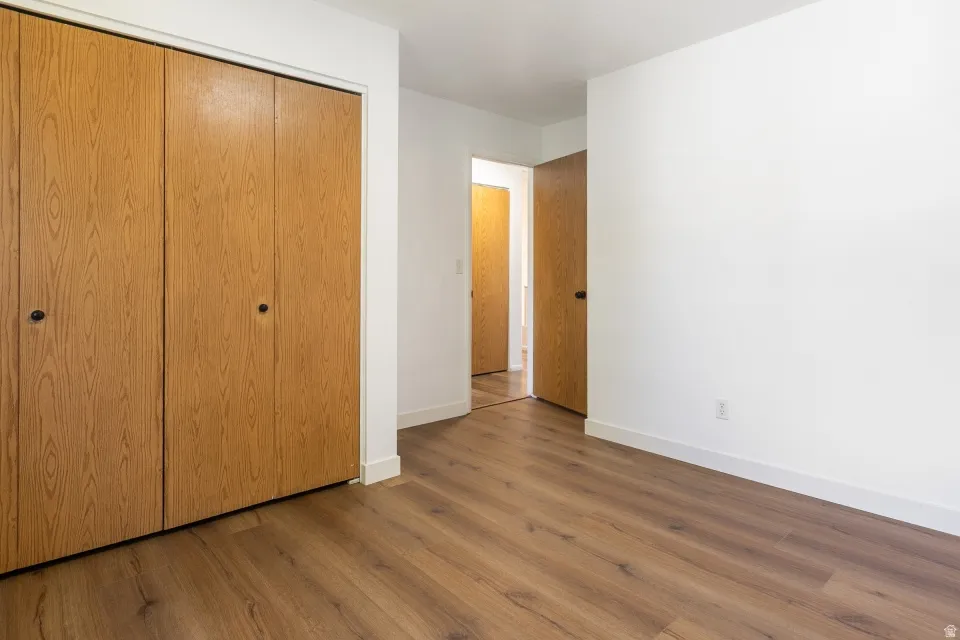 Wood-finish flooring and white walls
