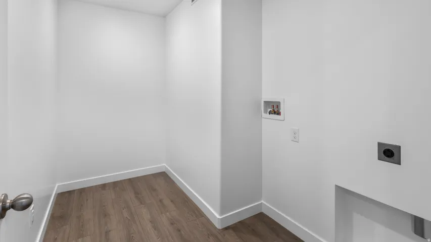 Wood-finish flooring with white walls