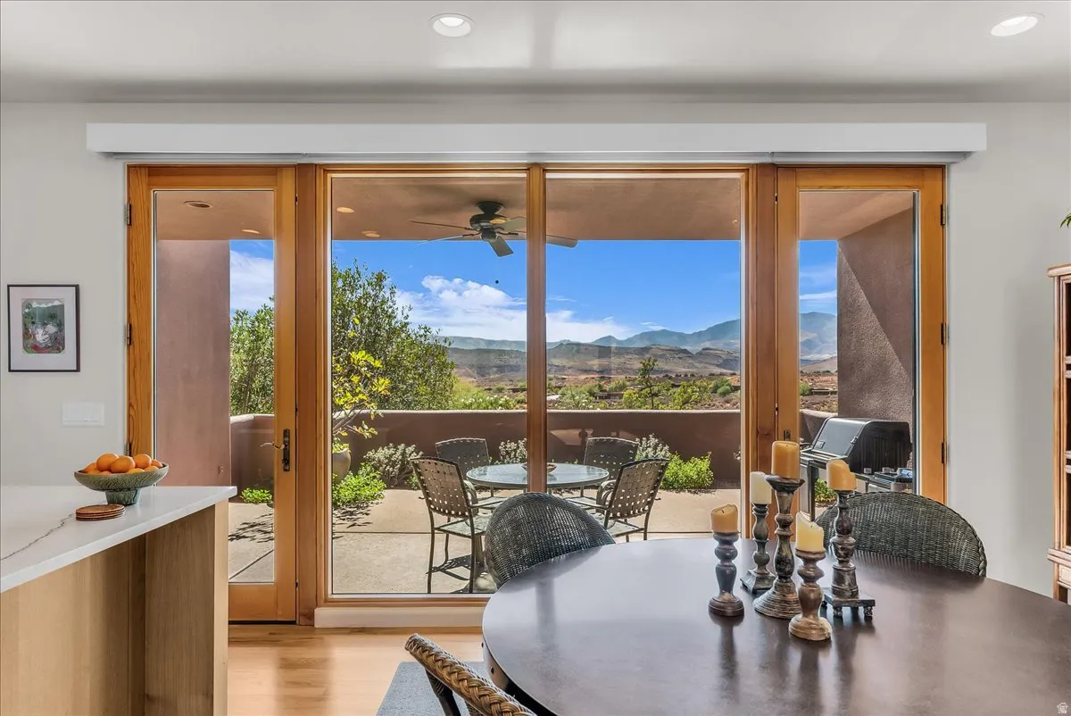 Dining Room with Expansive Glass Doors Opening to a Private Patio