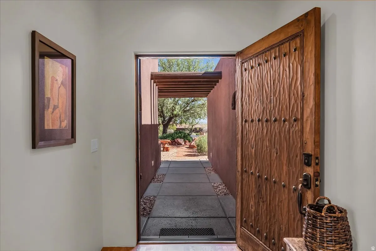 Custom Entry Door and Front Patio View