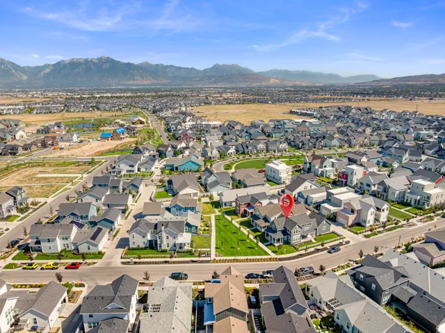 Expansive suburban neighborhood with mountain backdrop