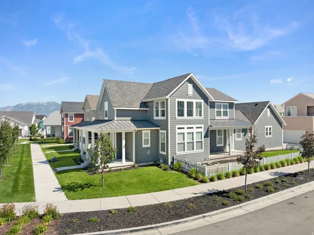 Gray siding exterior with multiple gables