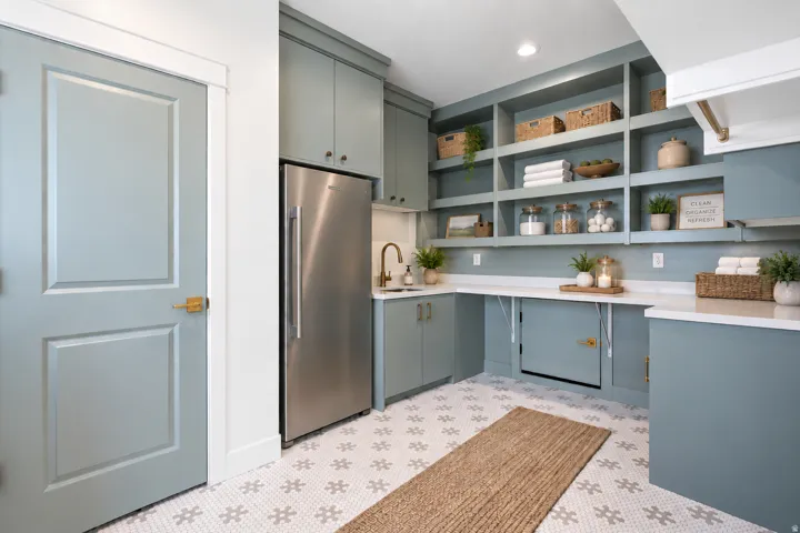 Digitally staged Walk in pantry/laundry room