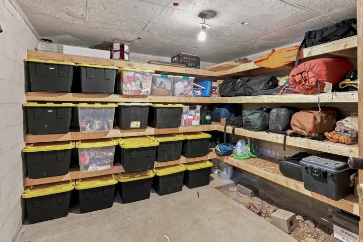Built-in wood shelving providing extensive storage