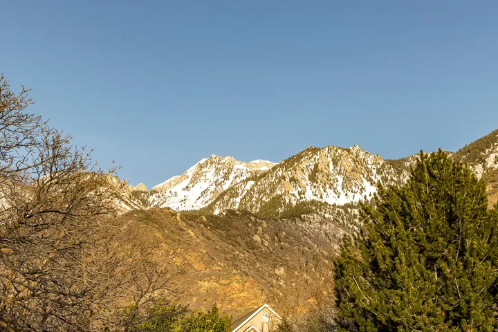 Snow-capped mountain peaks under a clear sky