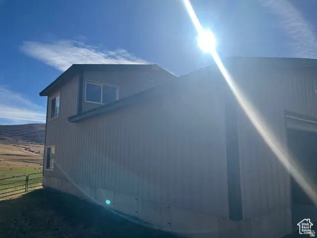 Vertical siding exterior with multiple windows