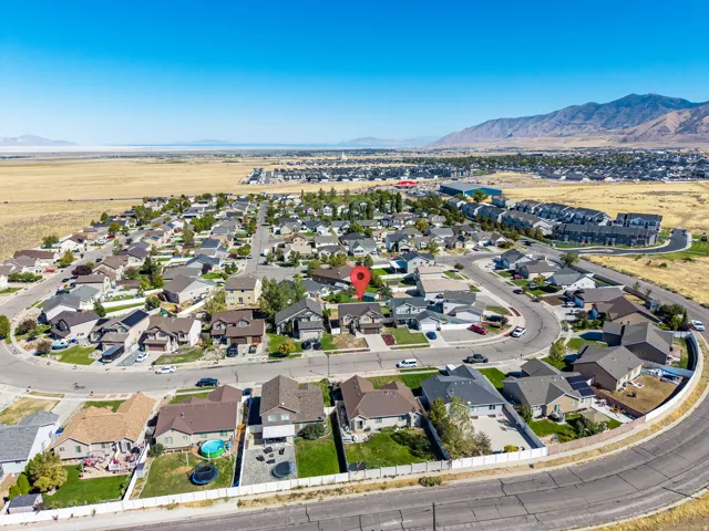Residential neighborhood setting with mountain backdrop