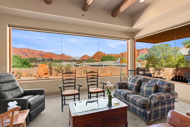 Expansive window wall with red rock scenery