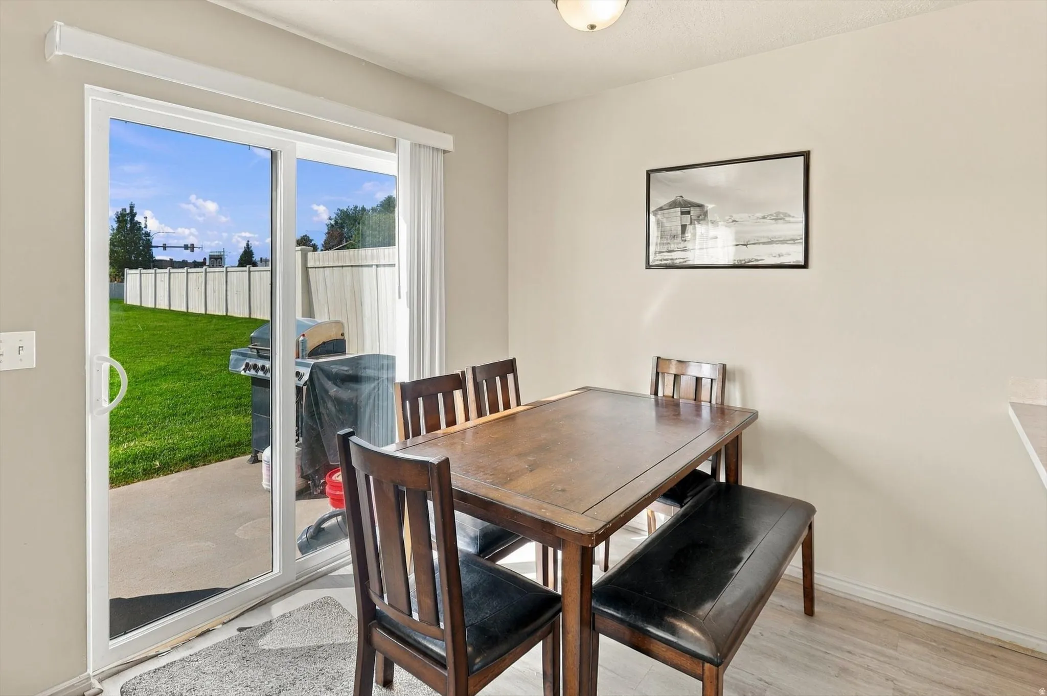 Sliding glass door provides direct access to the outdoor patio