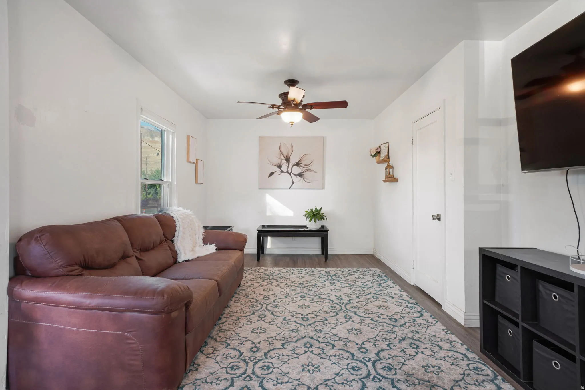 Recessed lighting and ceiling fan overhead