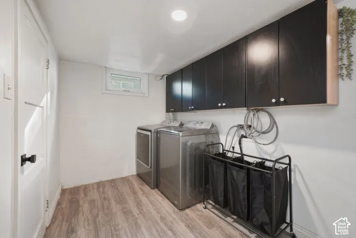 Wood-finish flooring, recessed ceiling lighting, and a window for natural light