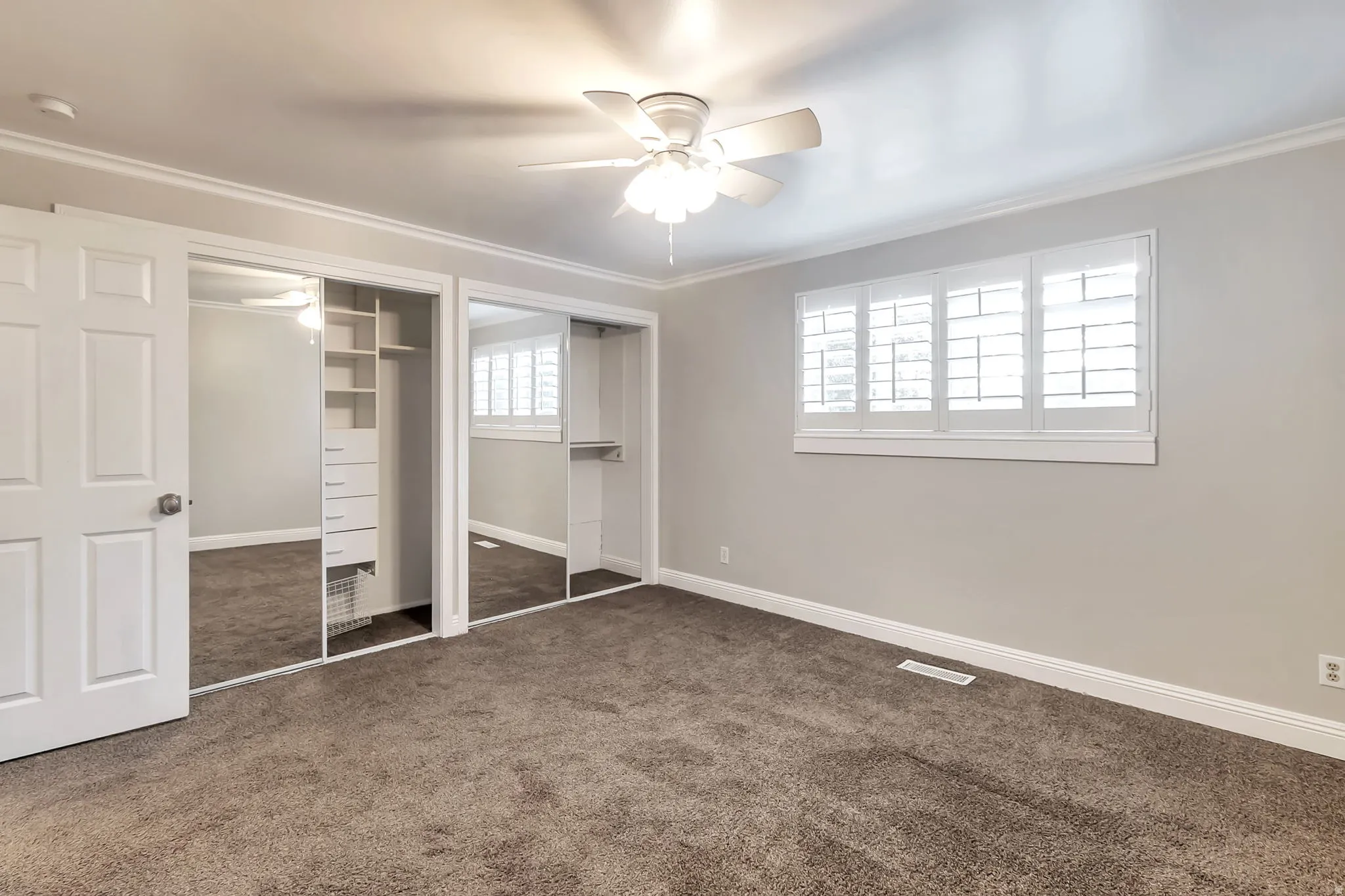 Primary bedroom w/his-n-hers closets