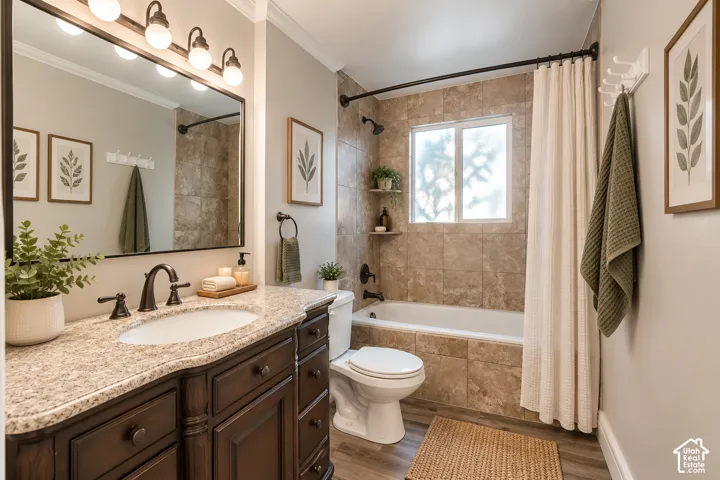 Main bathroom featuring a vanity with an undermount sink, granite countertop, and dark wood cabinetry