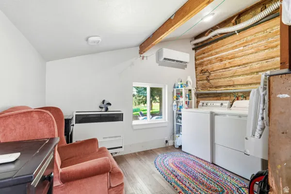 Wood-finish flooring with exposed ceiling beams
