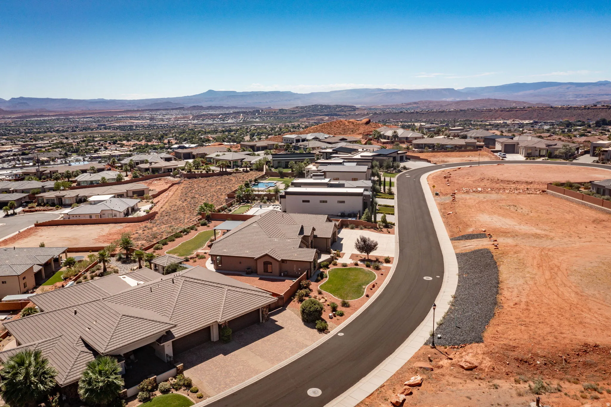 Expansive neighborhood setting with paved streets and established residences