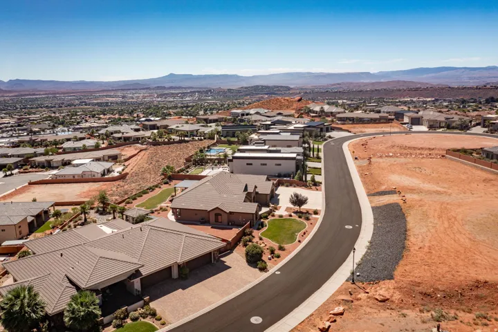 Expansive neighborhood setting with paved streets and established residences