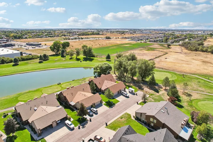 Residential community bordering a golf course with water features