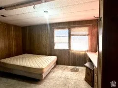 Bedroom located in the manufactured home.