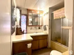 Full bathroom located in the manufactured home.