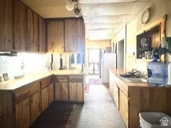 View towards entrance door and dining room.
