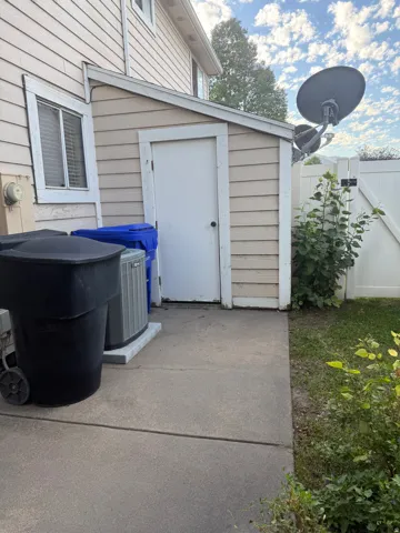 Patio and storage shed.