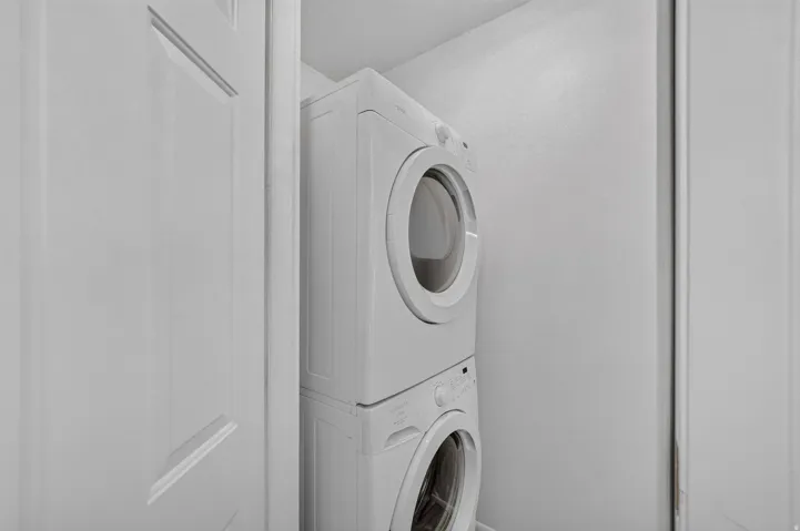 Stackable washer and dryer included.