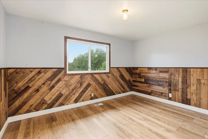 Wood-finish flooring with white trim