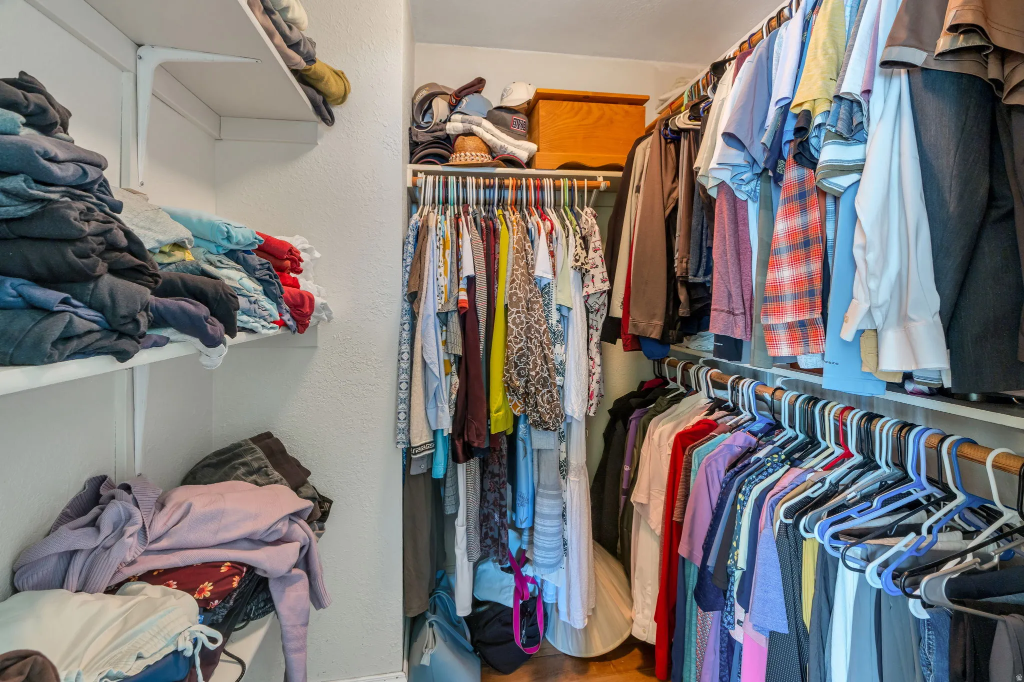 Built-in shelving and hanging rods for organized storage
