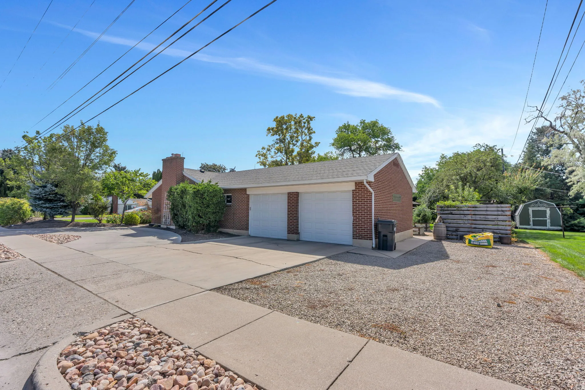 Brick exterior with a side-entry two-car garage