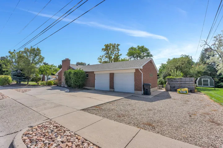 Brick exterior with a side-entry two-car garage